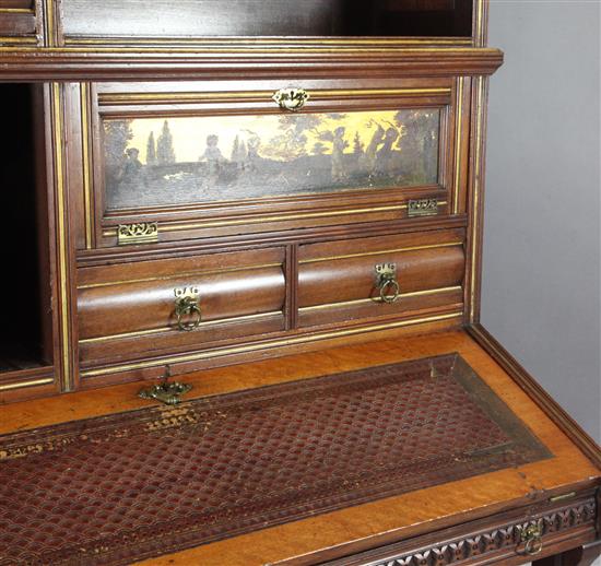 A Gillows Aesthetic Movement walnut, parcel gilt and thuya wood secretaire cabinet, c 1880s